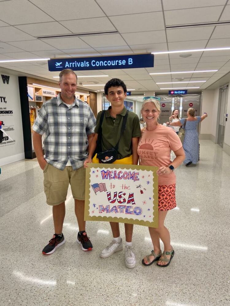 My American host parents welcoming me at the airport